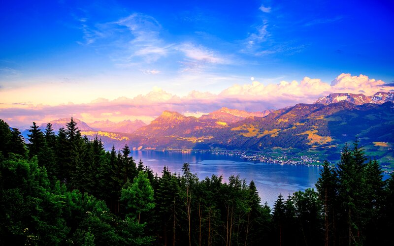 Mountain Lake Landscape — Blue, Serene, Sunset, Photograph, Mountains, Forest, Village