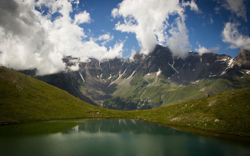 Mountain Lake Landscape — Green, Serene, Afternoon, Photograph, Mountains, Clouds