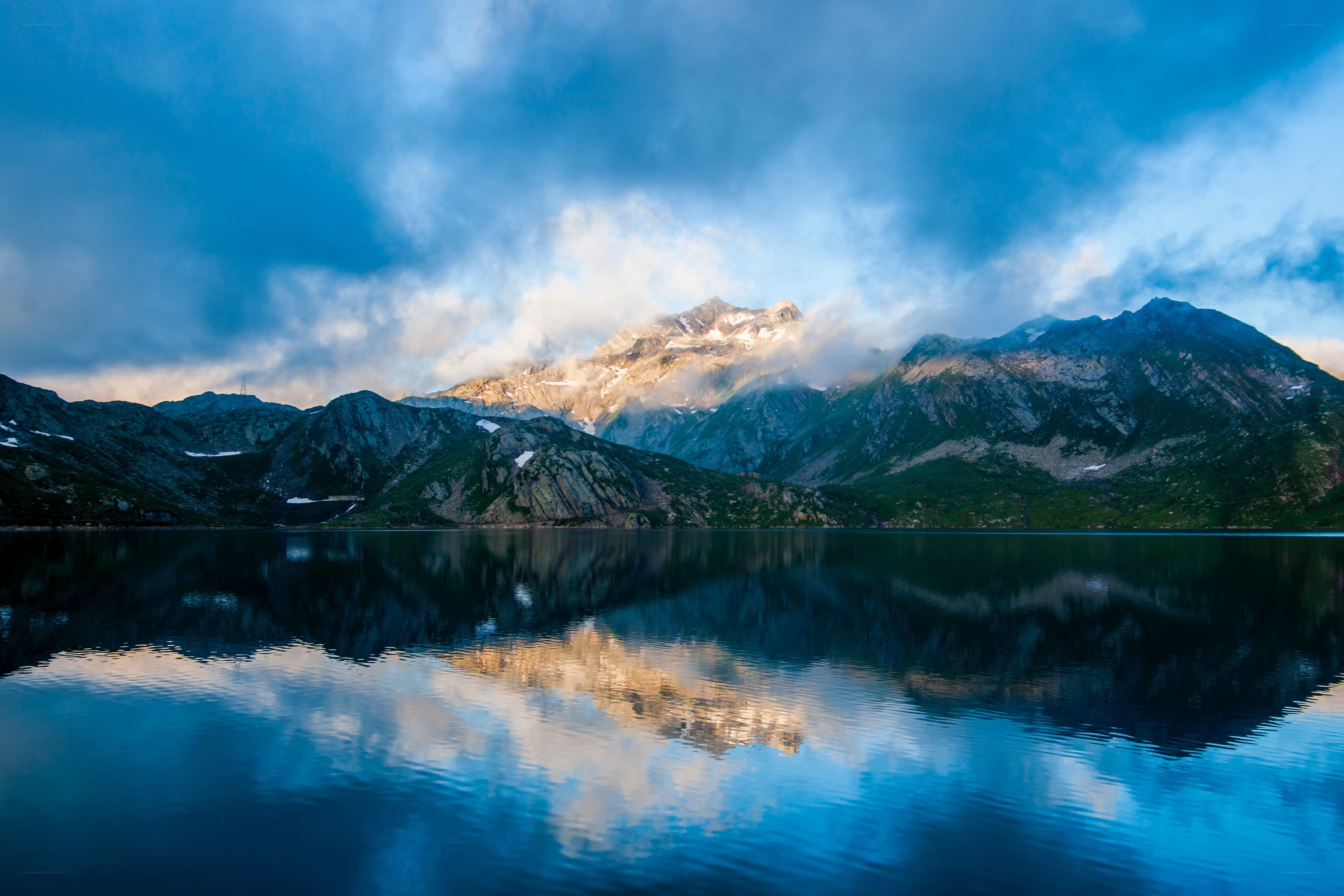 Mountain lake reflection at dawn