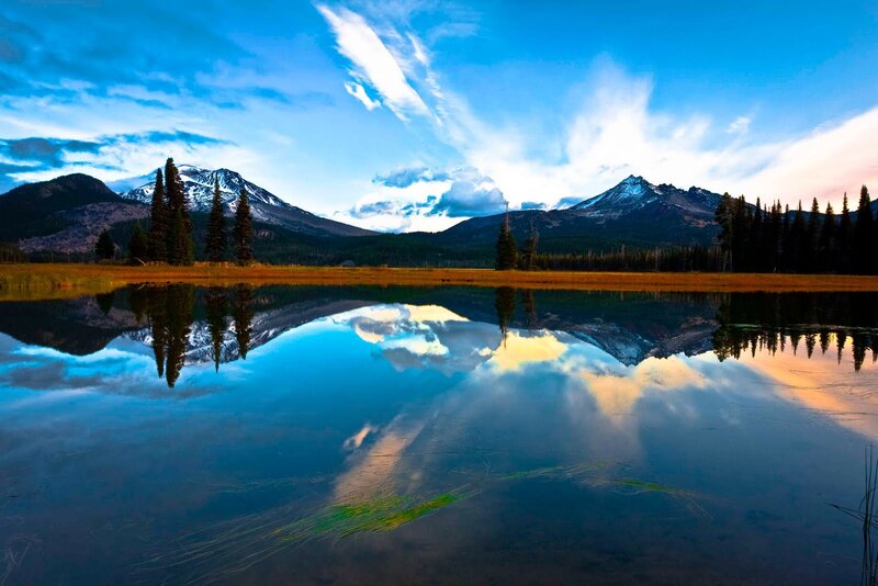 Mountain lake reflection at dusk