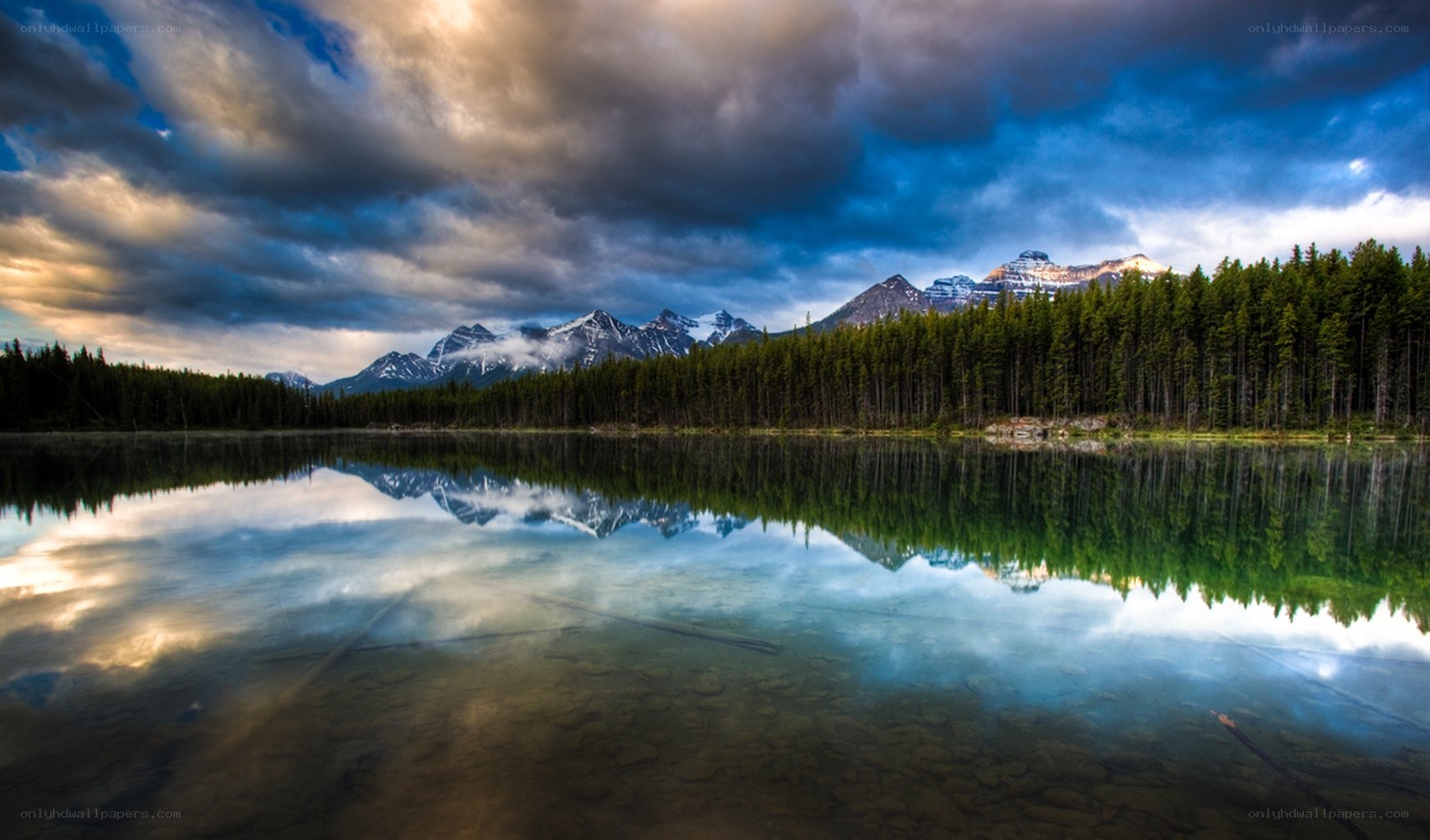 Mountain lake reflection at dusk