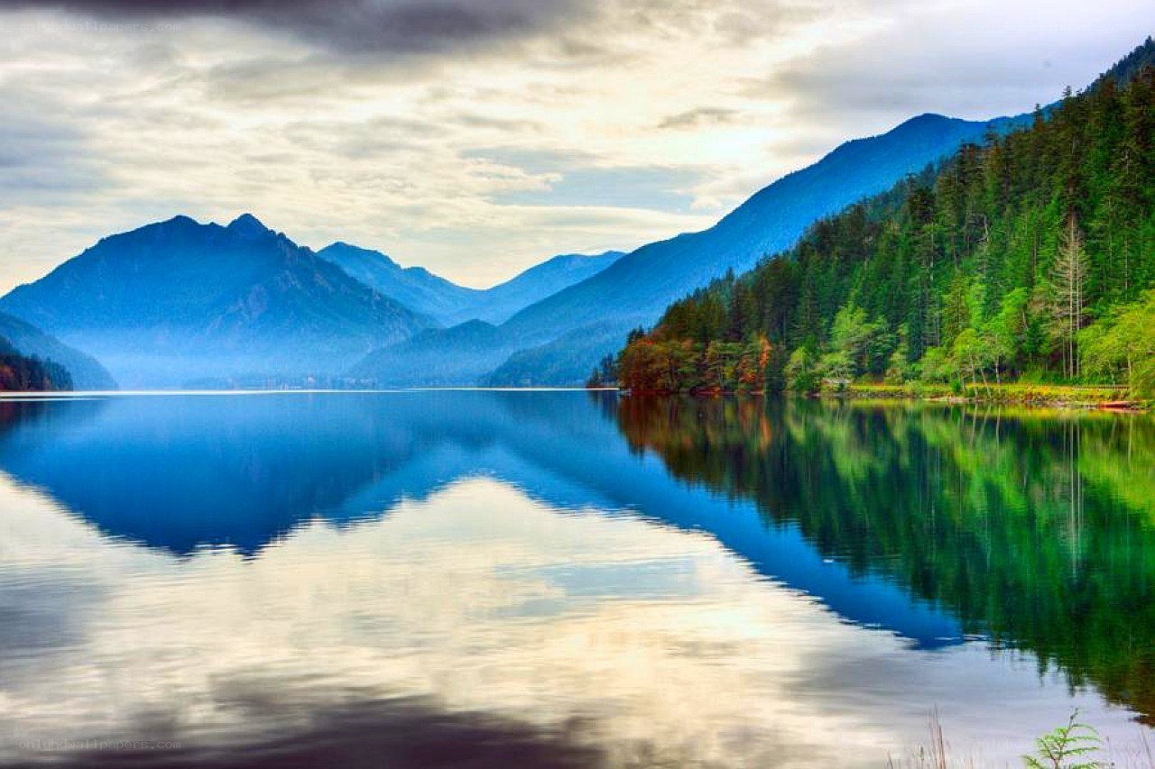 Mountain lake reflection at dusk