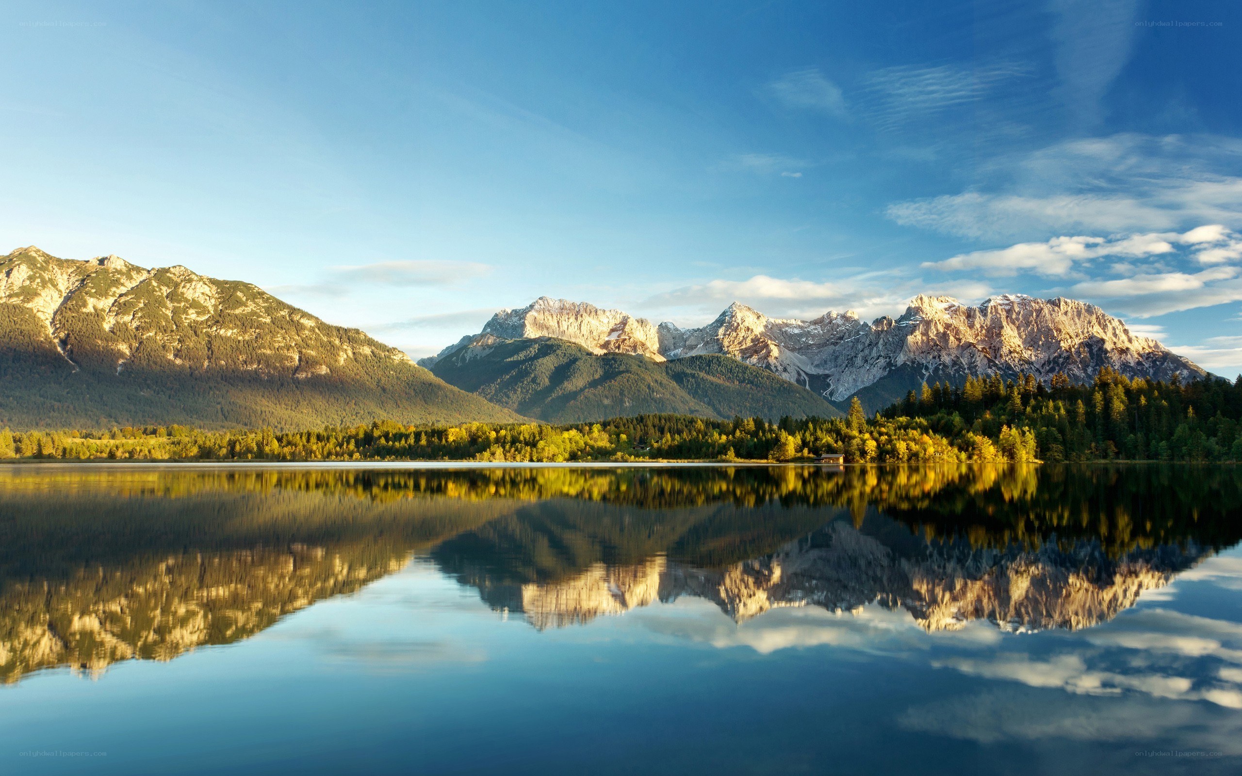 Mountain lake reflection at sunrise