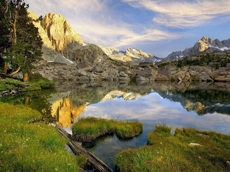 Mountain lake reflection at sunrise