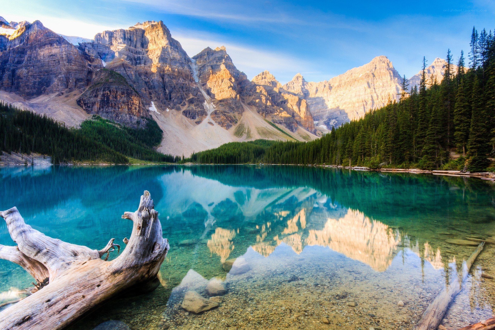 Mountain lake reflection at sunrise