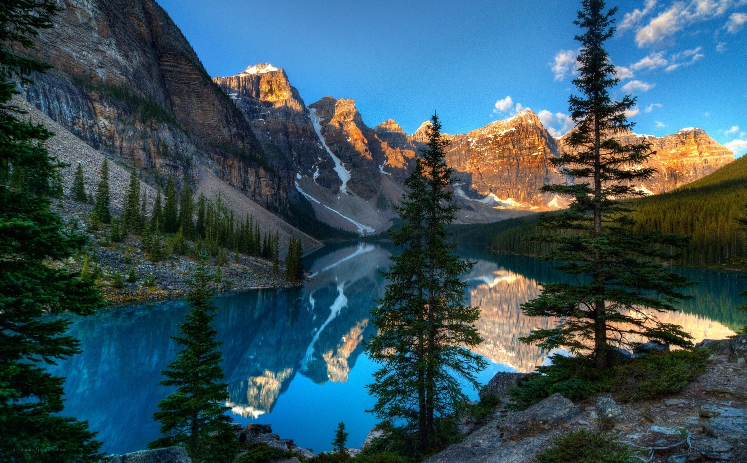 Mountain lake reflection at sunrise