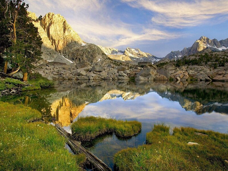 Mountain lake reflection at sunrise