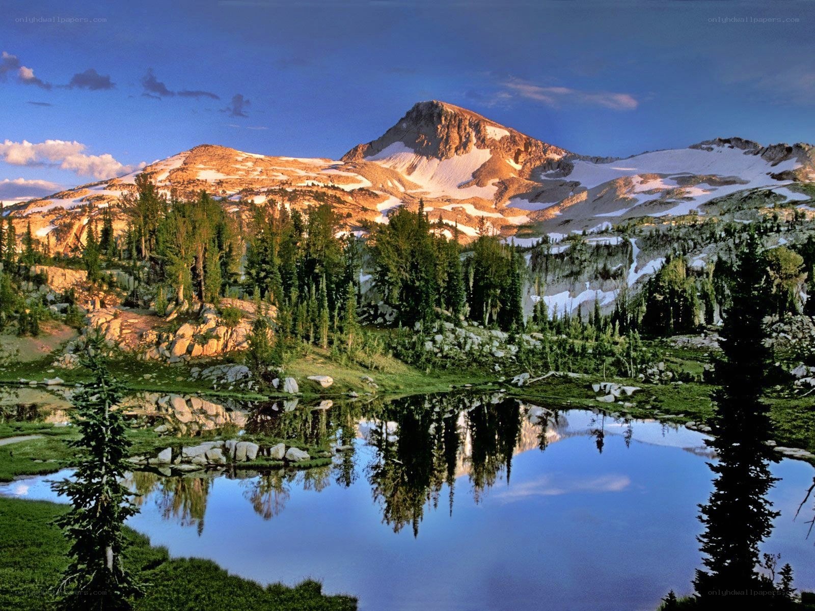 Mountain lake reflection at sunset