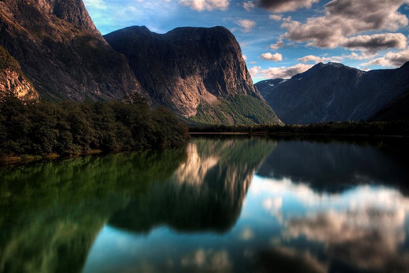 Mountain lake reflection at sunset