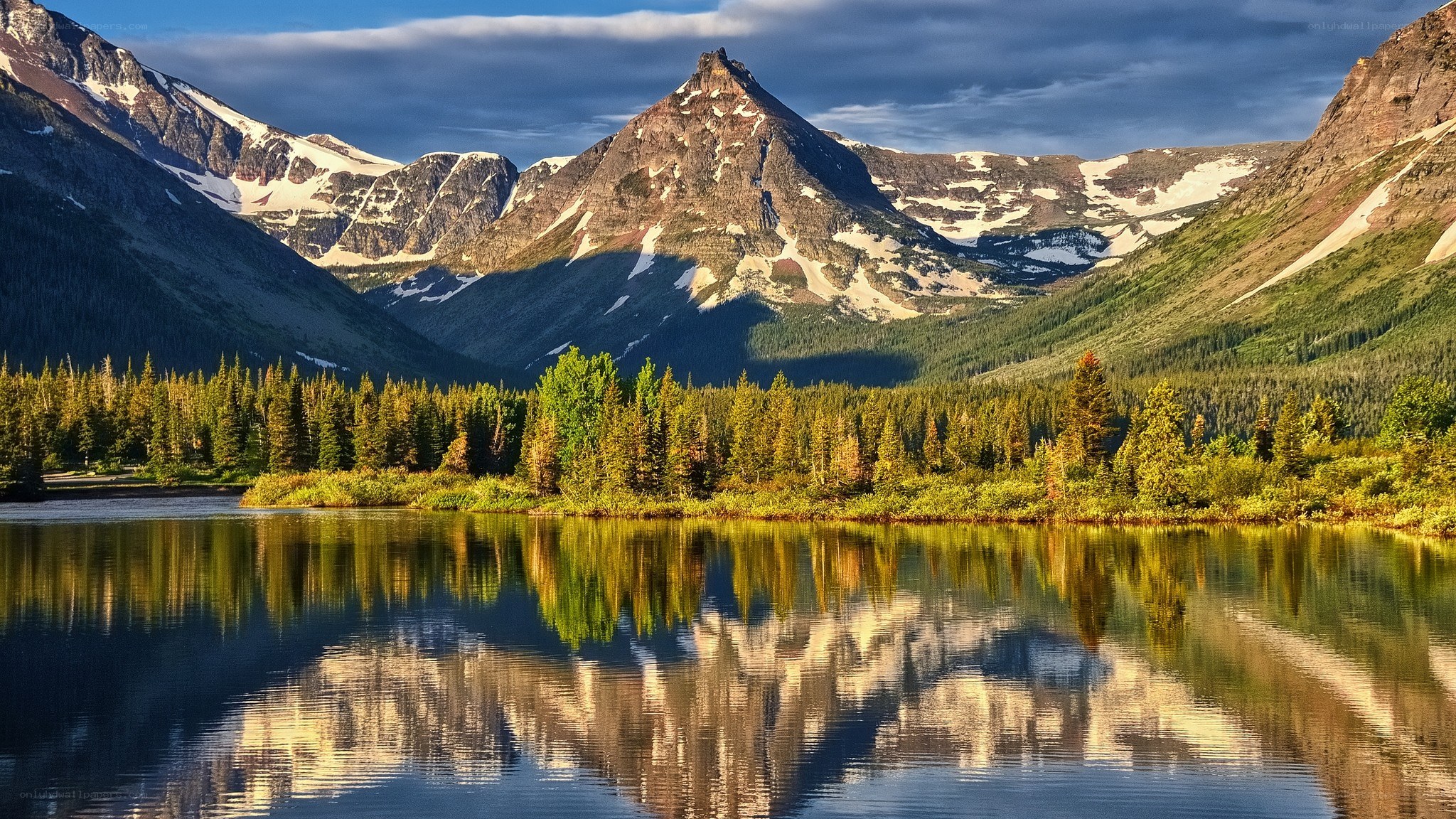Mountain lake reflection at sunset
