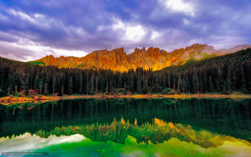 Mountain lake reflection at sunset