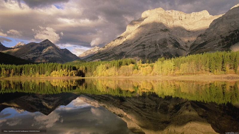Mountain lake reflection at sunset