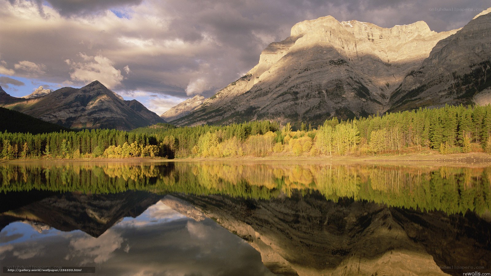 Mountain lake reflection at sunset