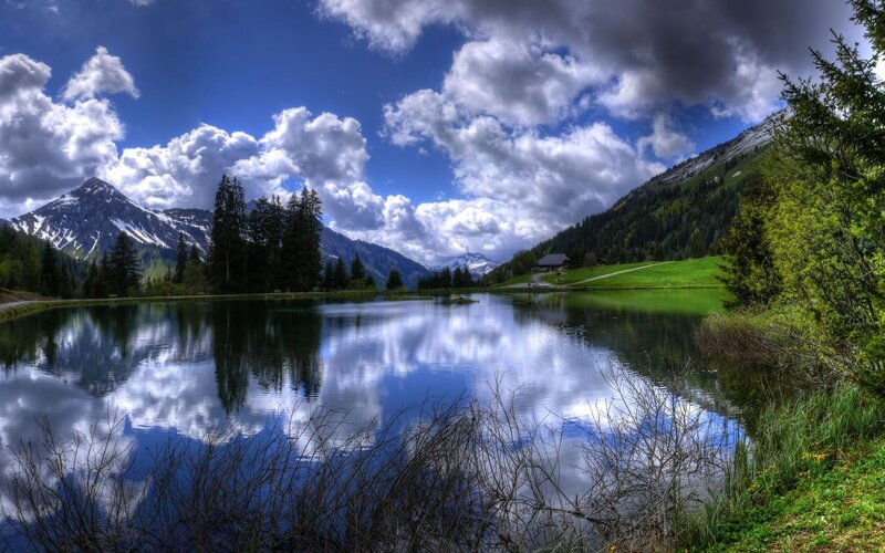 Mountain Lake Reflection — Blue, Dramatic, Afternoon, Photograph, Mountains, Trees, Clouds, Cabin