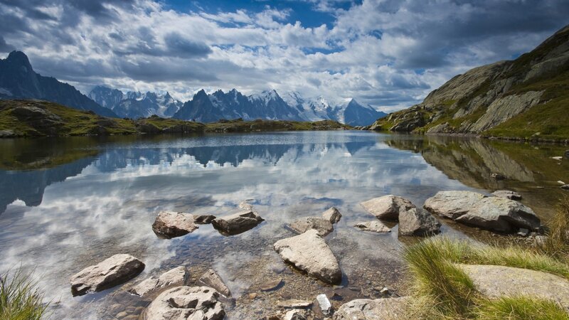 Mountain Lake Reflection — Blue, Serene, Afternoon, Photograph, Mountains, Clouds, Rocks, White