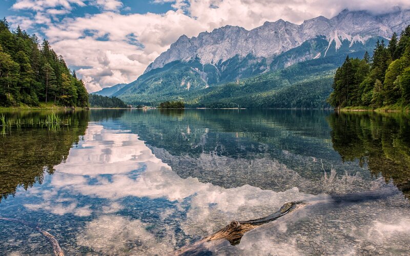 Mountain Lake Reflection — Blue, Serene, Afternoon, Photograph, Mountains, Forest, Clouds, Driftwood