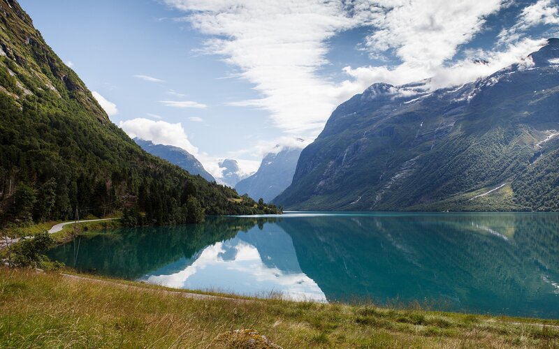 Mountain Lake Reflection — Blue, Serene, Afternoon, Photograph, Mountains, Forest, Road, Sky
