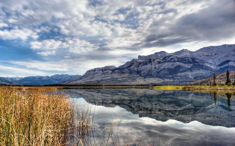 Mountain Lake Reflection — Blue, Serene, Afternoon, Photograph, Mountains, Sky, Reeds