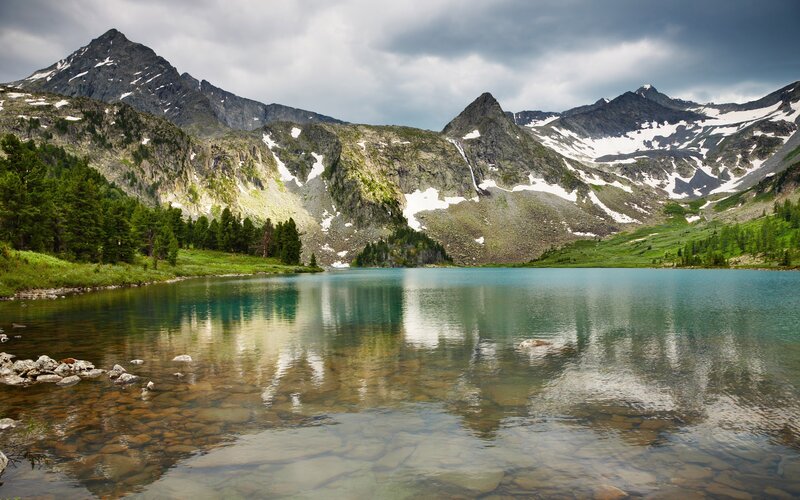 Mountain Lake Reflection — Blue, Serene, Afternoon, Photograph, Mountains, Trees, Snow, Green, Gray