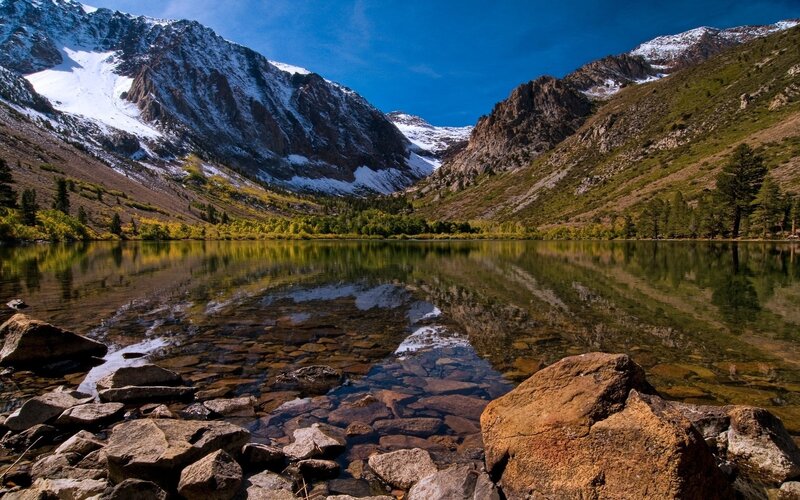 Mountain Lake Reflection — Blue, Serene, Afternoon, Photograph, Snow-capped Mountains, Trees
