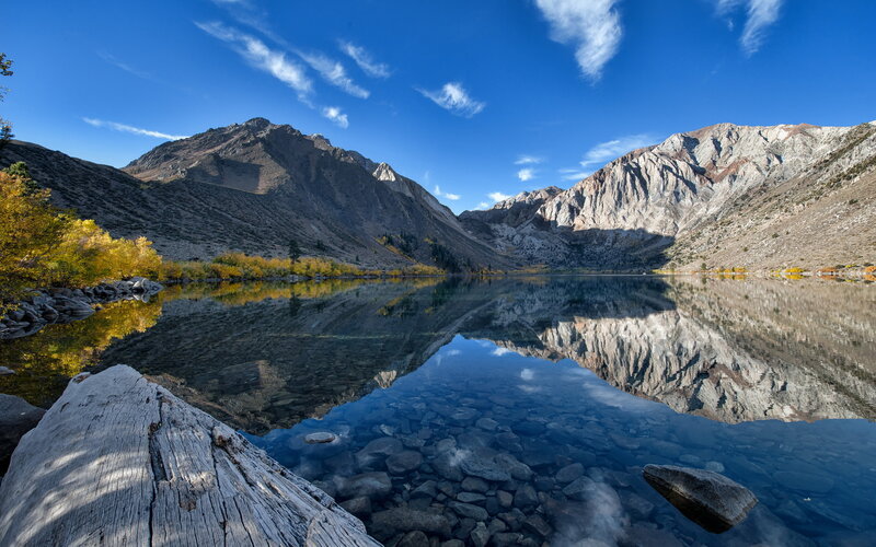 Mountain Lake Reflection — Blue, Serene, Autumn, Photograph, Mountains, Trees, Driftwood