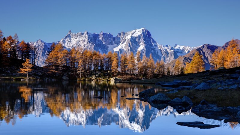Mountain Lake Reflection — Blue, Serene, Autumn, Photograph, Snow-capped Mountains, Trees, Rocks