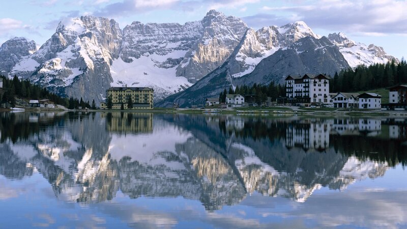 Mountain Lake Reflection — Blue, Serene, Morning, Photograph, Mountains, Buildings, Trees, White