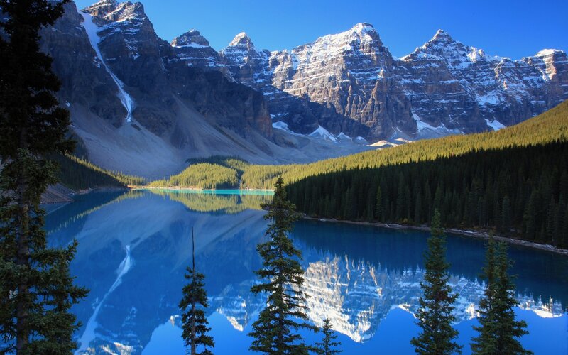 Mountain Lake Reflection — Blue, Serene, Morning, Photograph, Snow-capped Mountains, Evergreen Trees, Calm Water