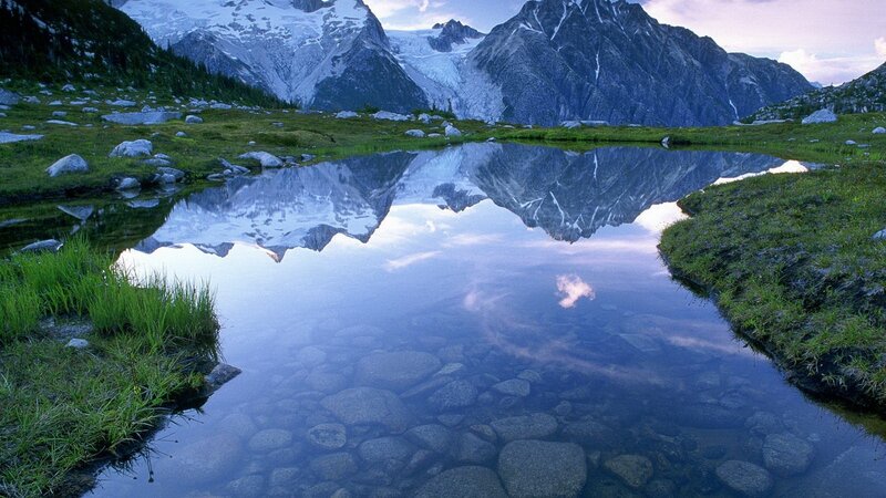 Mountain Lake Reflection — Blue, Serene, Sunset, Photograph, Mountains, Glacier, Grass, Rocks, Green, White