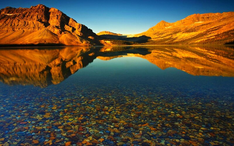 Mountain Lake Reflection — Blue, Serene, Sunset, Photograph, Mountains, Pebbles