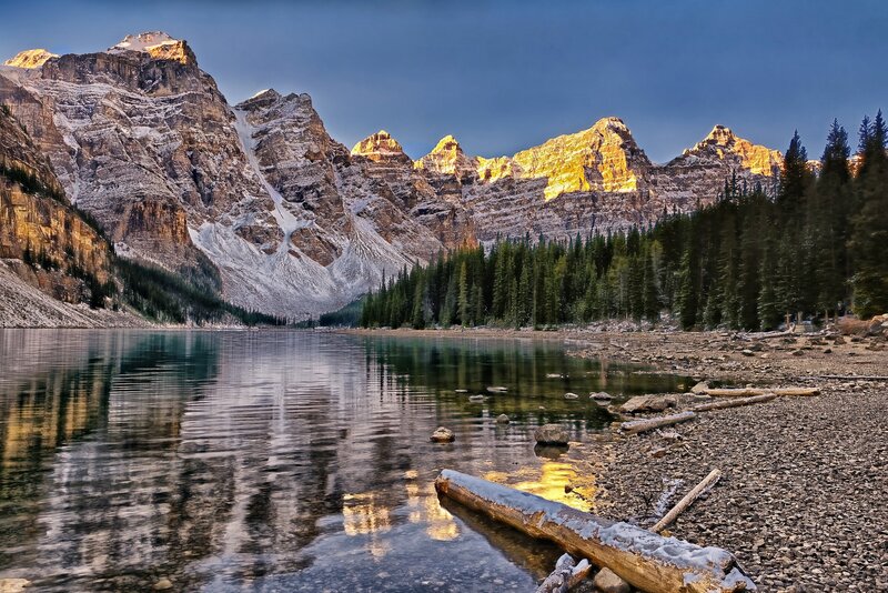Mountain Lake Reflection — Blue, Serene, Sunset, Photograph, Mountains, Trees, Logs
