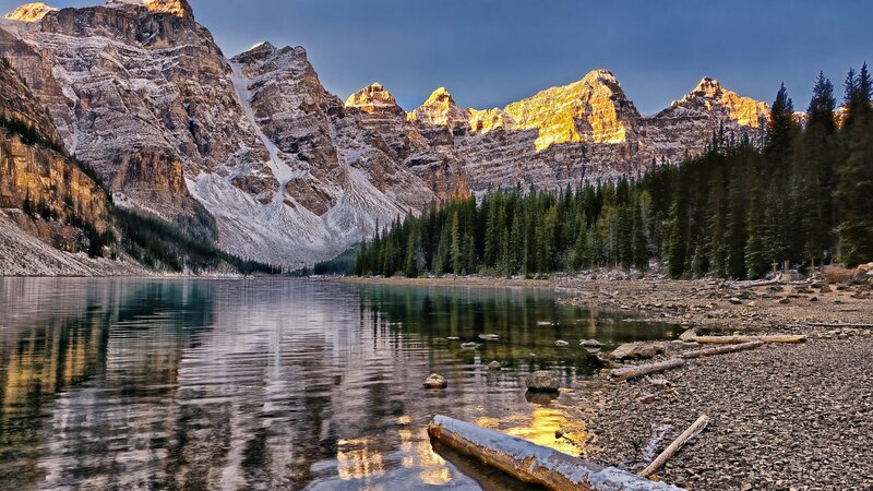 Mountain Lake Reflection — Blue, Serene, Sunset, Photograph, Snow-capped Peaks, Evergreen Trees