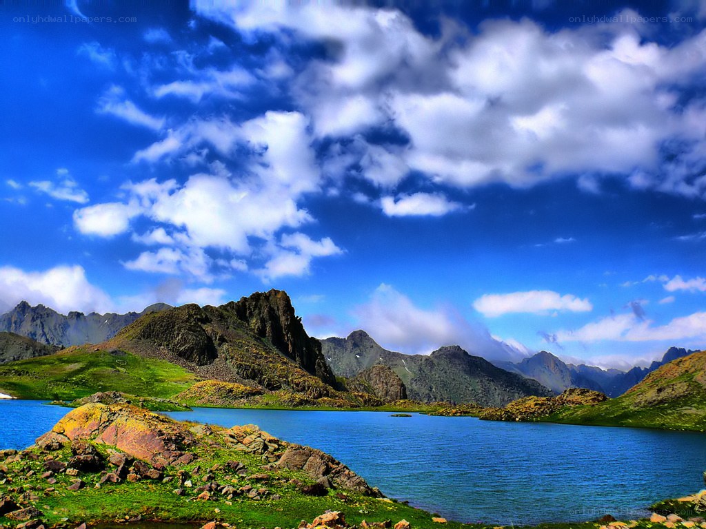 Mountain lake under blue sky