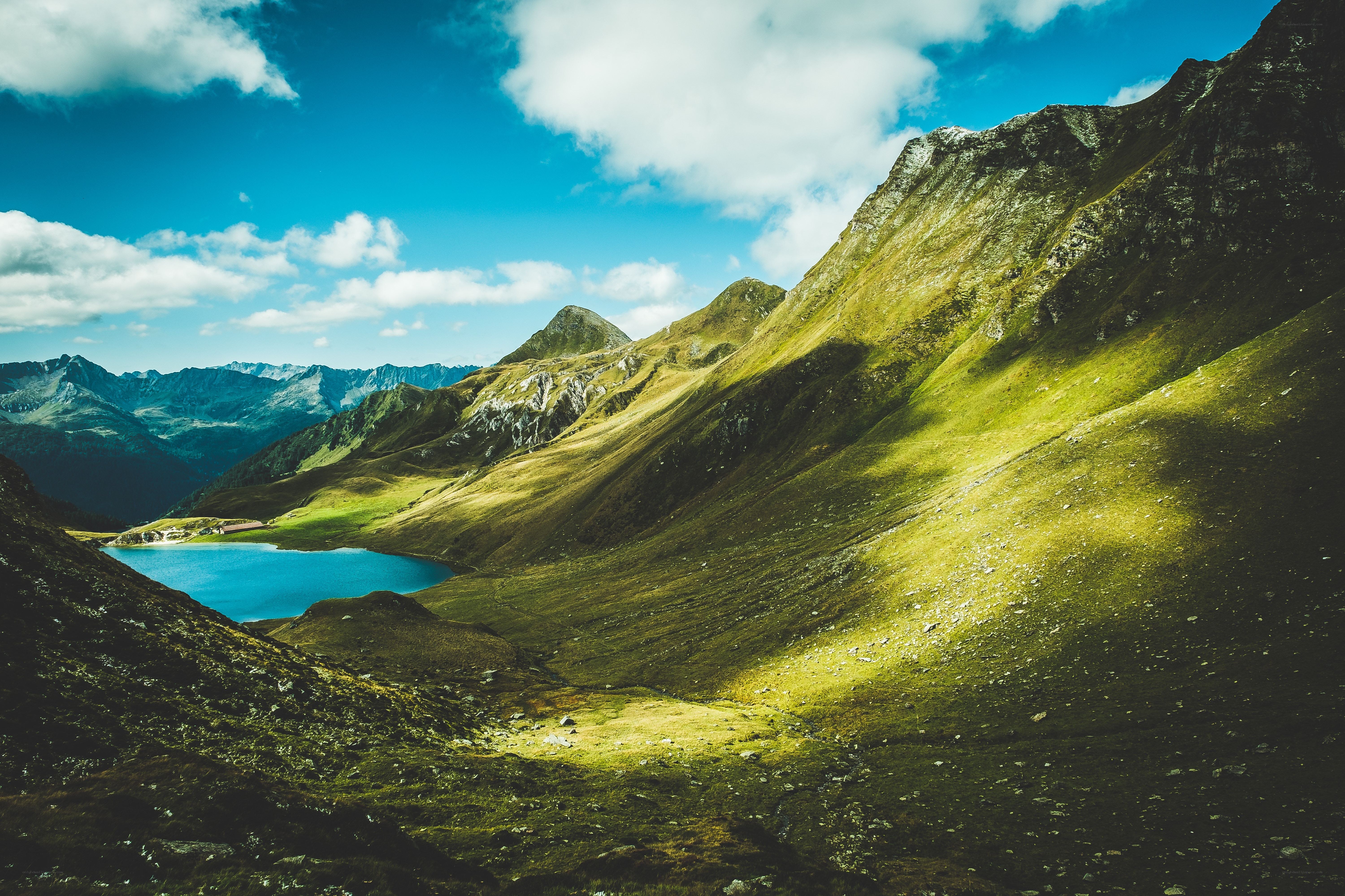 Mountain lake under blue sky