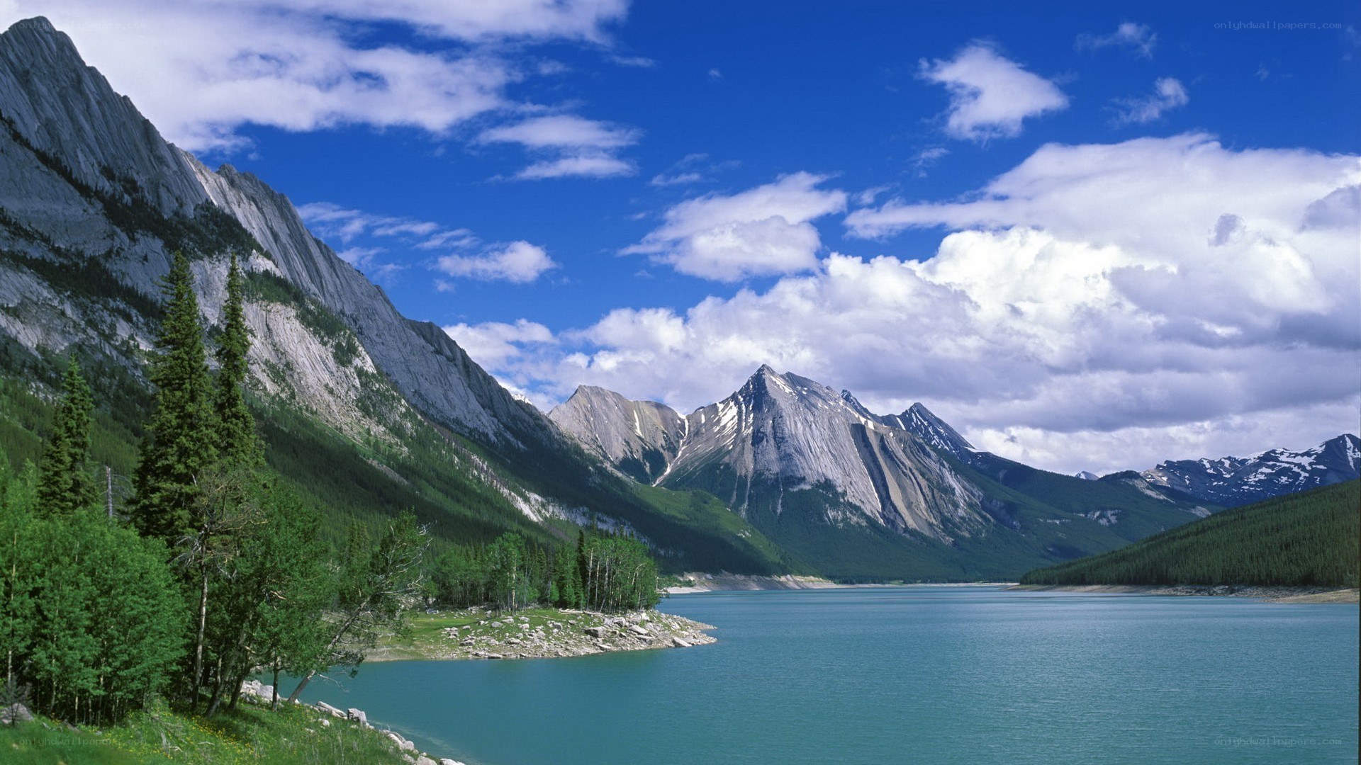 Mountain lake under blue sky