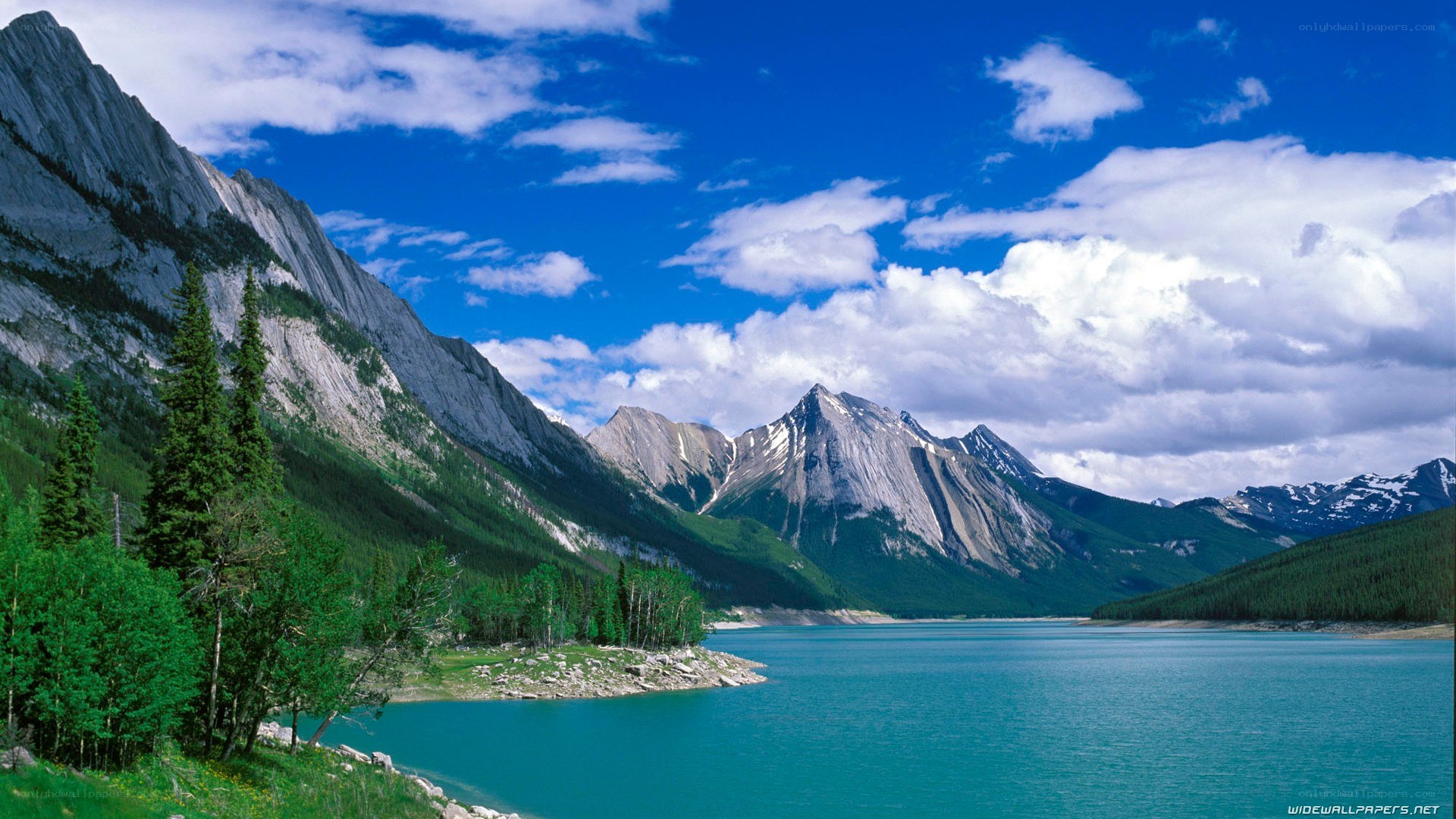 Mountain lake under blue sky