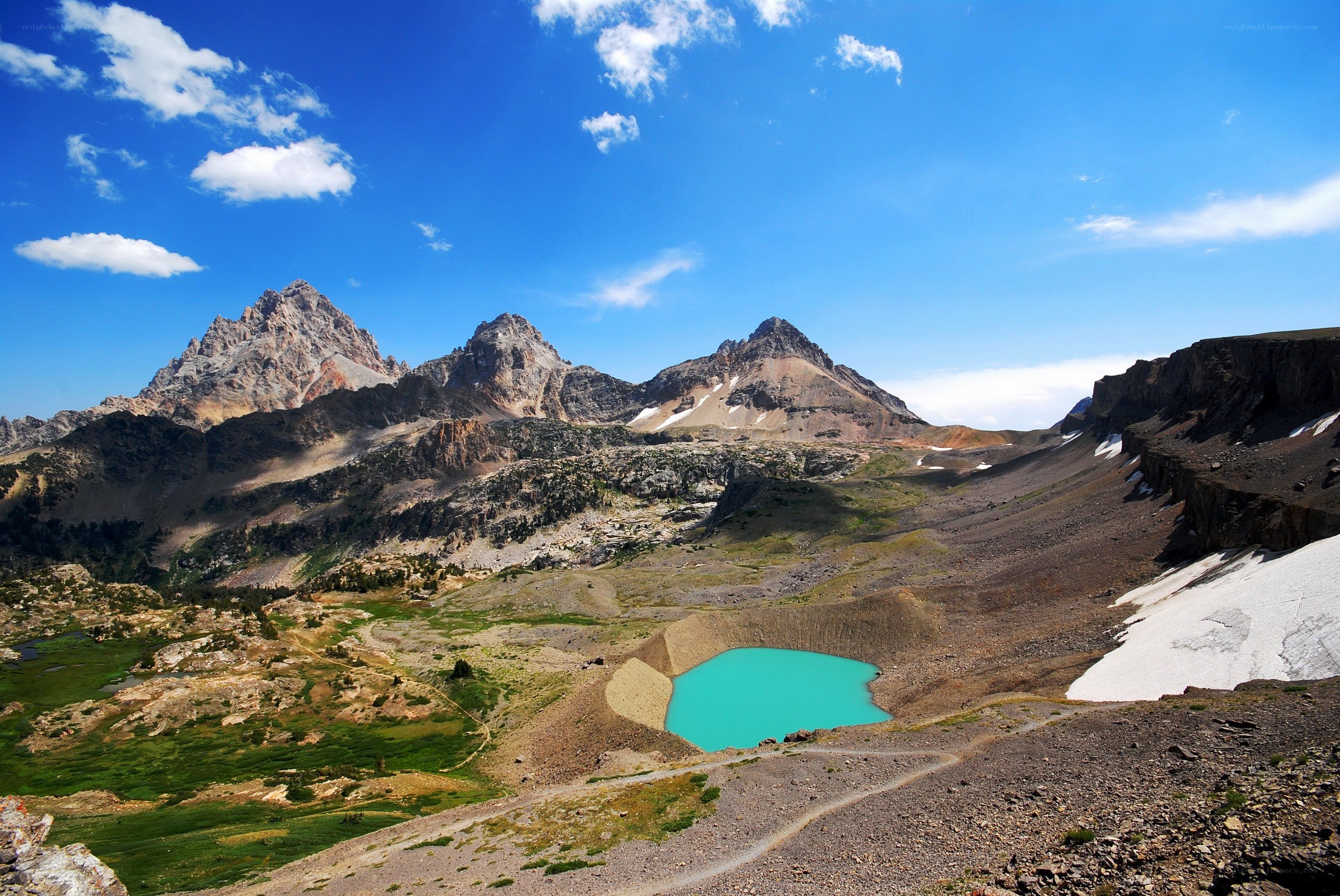 Mountain lake under blue sky