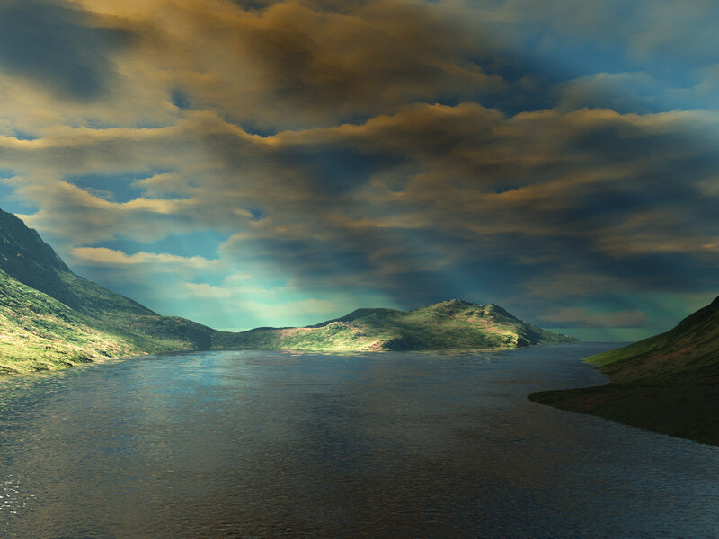 Mountain lake under cloudy sky