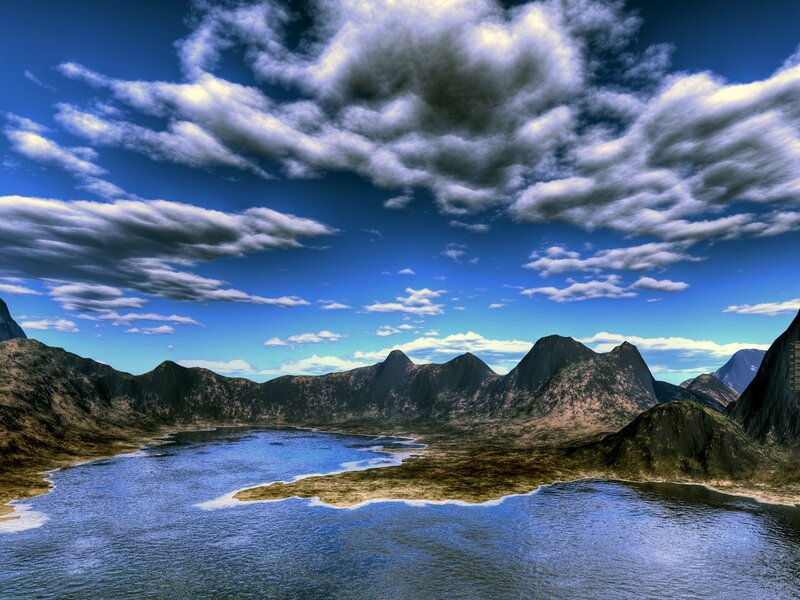 Mountain lake under cloudy sky