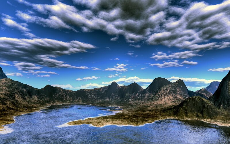 mountain lake under cloudy sky