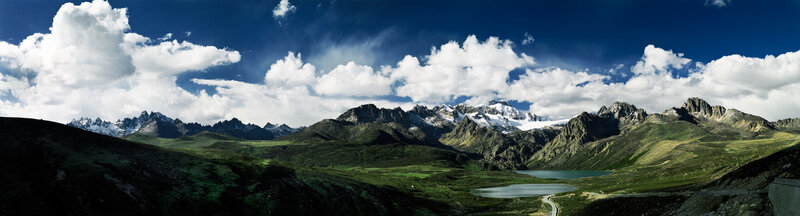 Mountain lake under cloudy sky