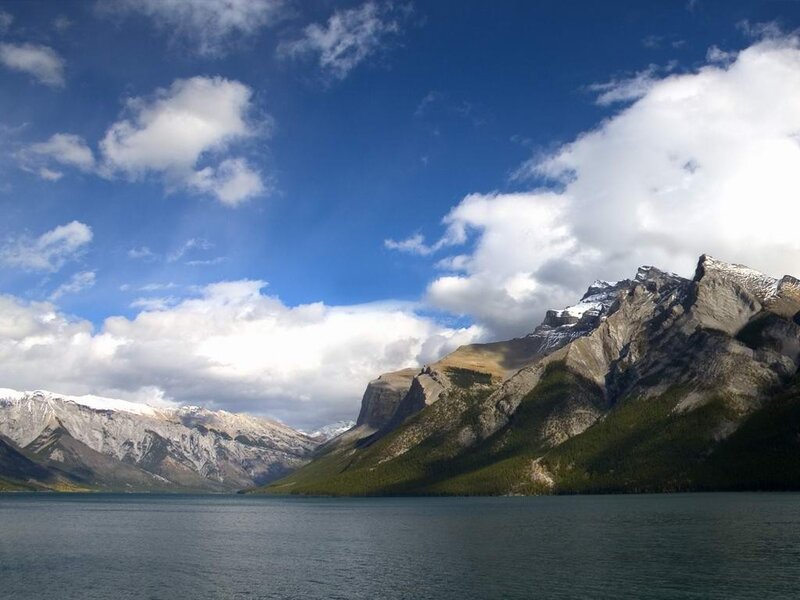 Mountain lake under cloudy sky