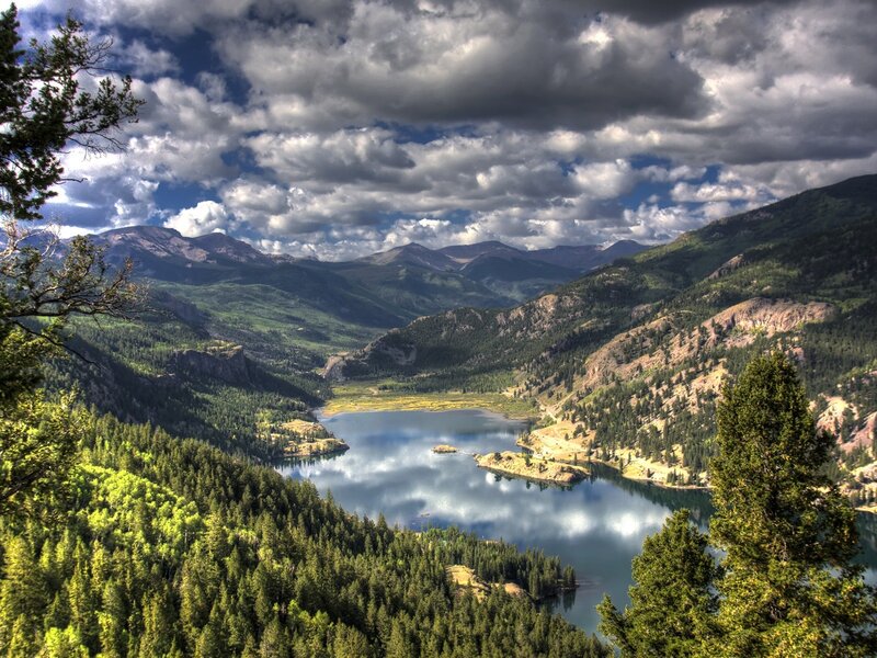 Mountain lake under cloudy sky