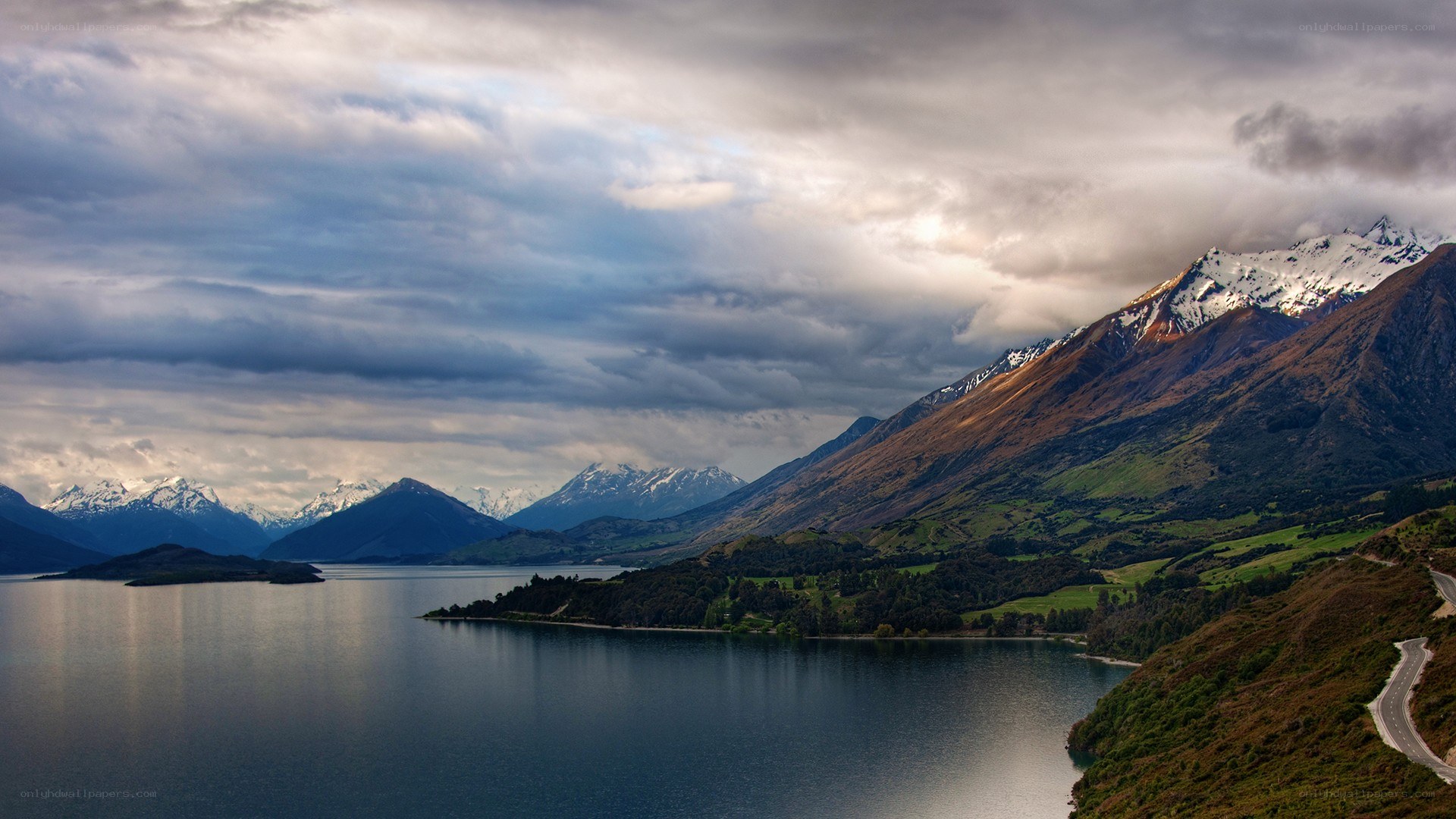 Mountain lake under cloudy sky