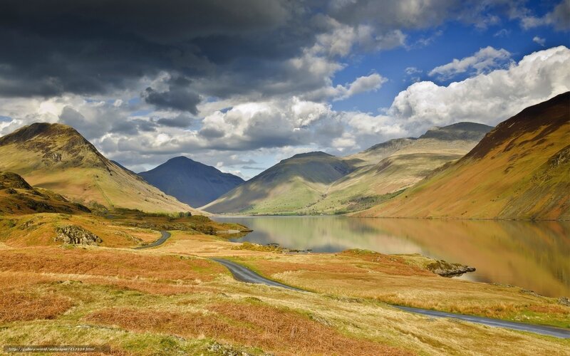 Mountain lake under dramatic sky
