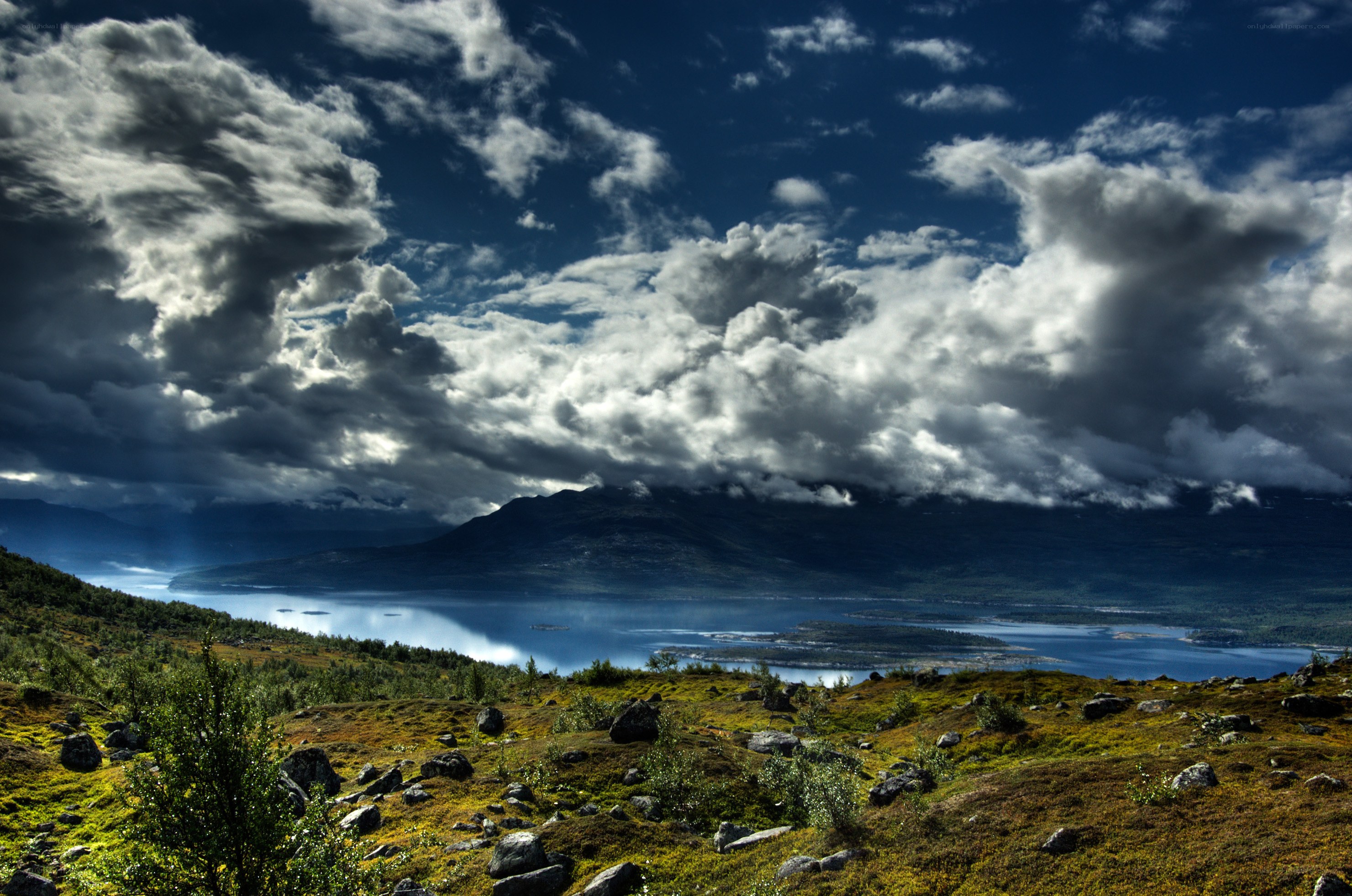 Mountain lake under dramatic sky