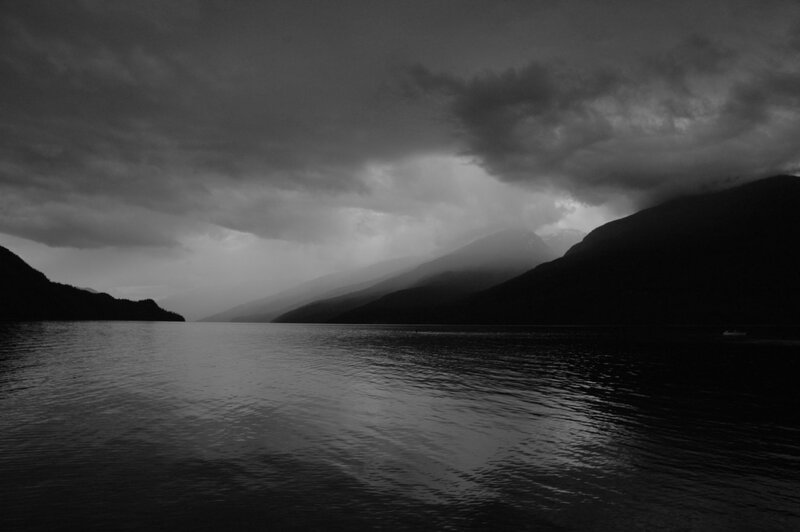 Mountain Lake under Storm Clouds