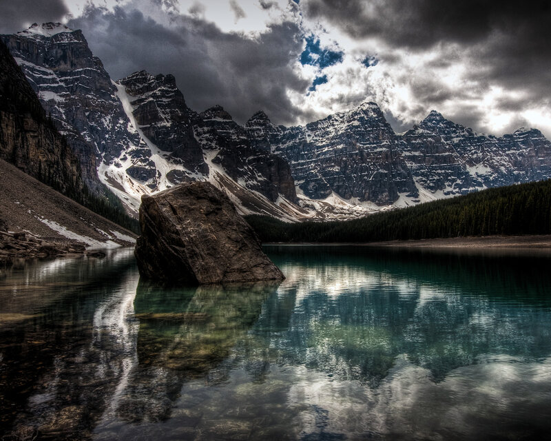 Mountain lake under stormy sky