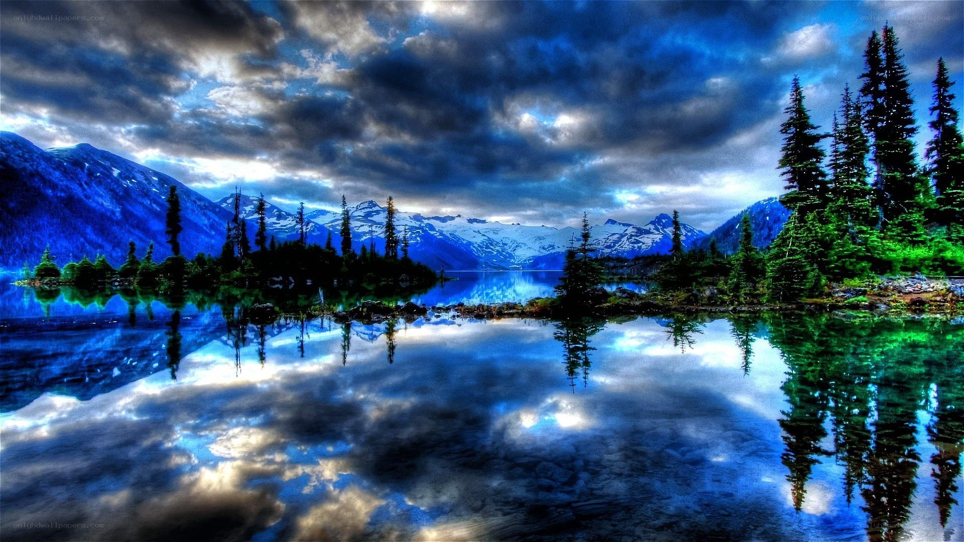 Mountain lake under stormy sky