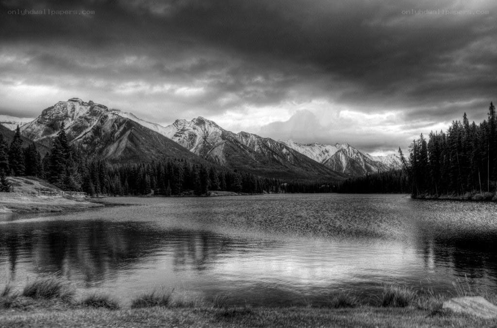 Mountain lake under stormy sky